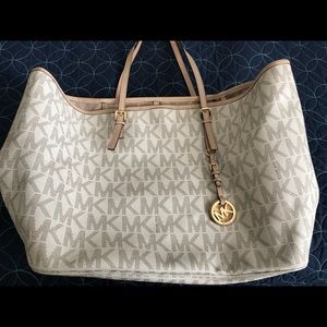 Large MK tote and matching wallet.